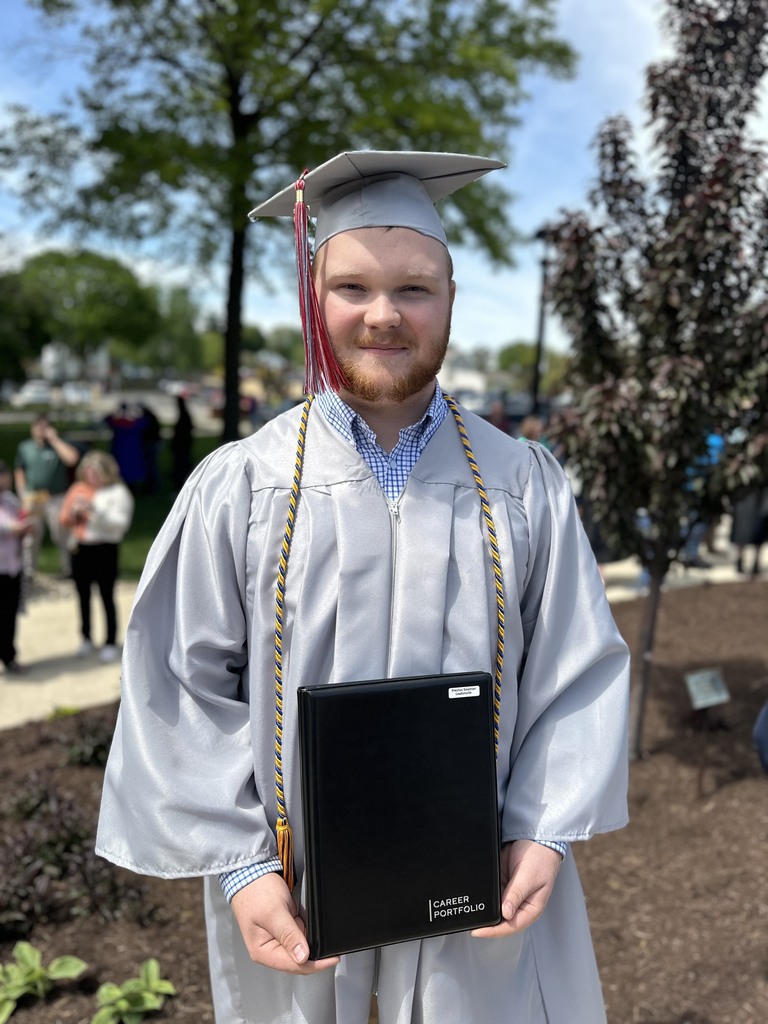 Photo of one male graduate