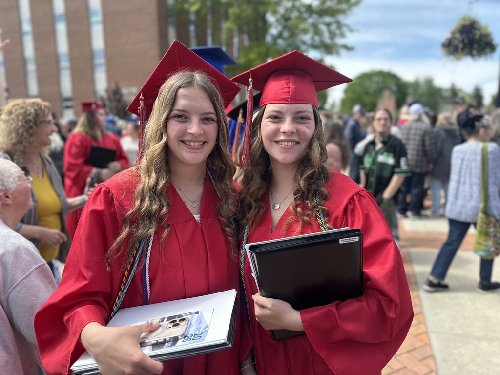 Photo of two female graduates