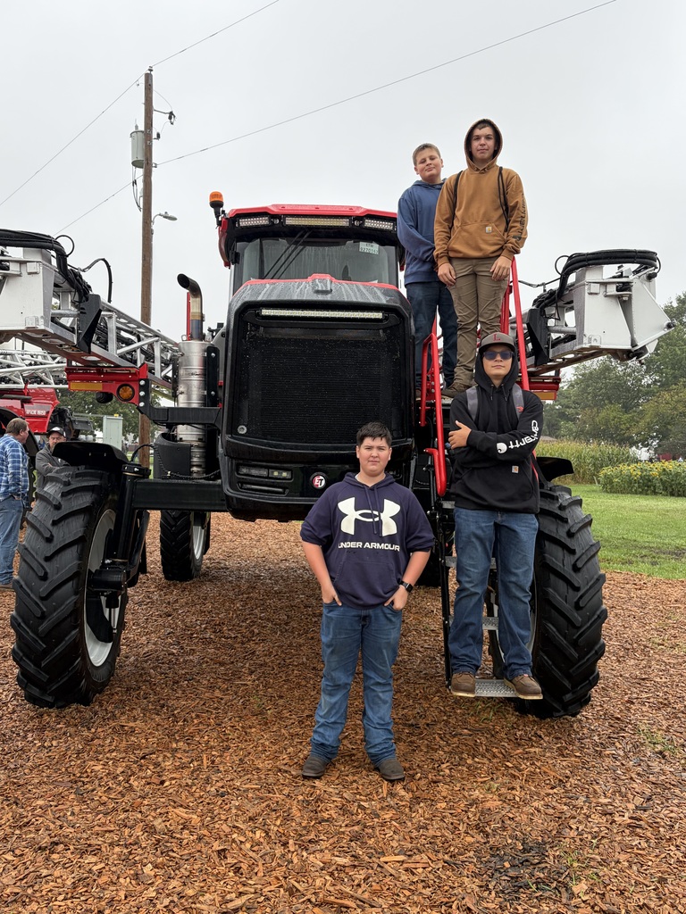 Students exploring ag equipment. 