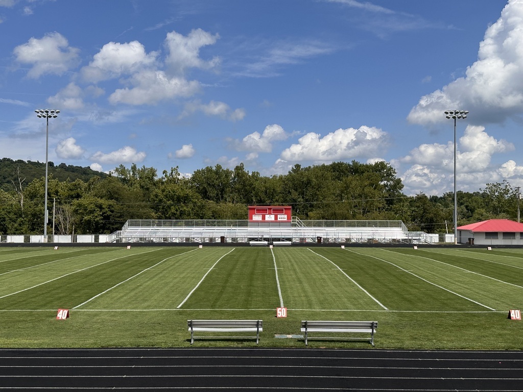 Photo of the football field and the visitors side.