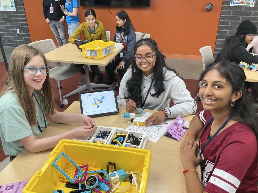 Four LCPS students participate in a hands-on activity during Amazon Girls’ Tech Day at The Academies of Loudoun.