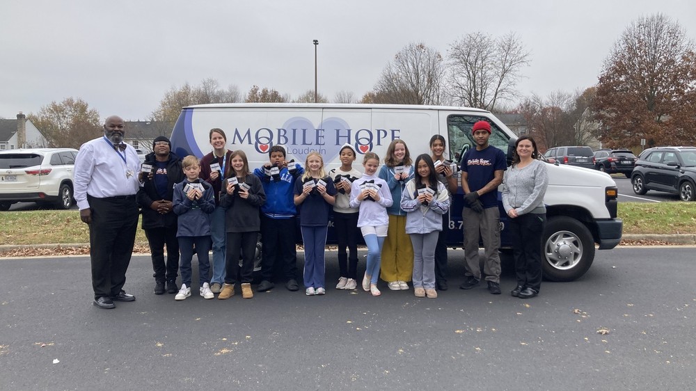 SOCKtober Donation to Mobile Hope