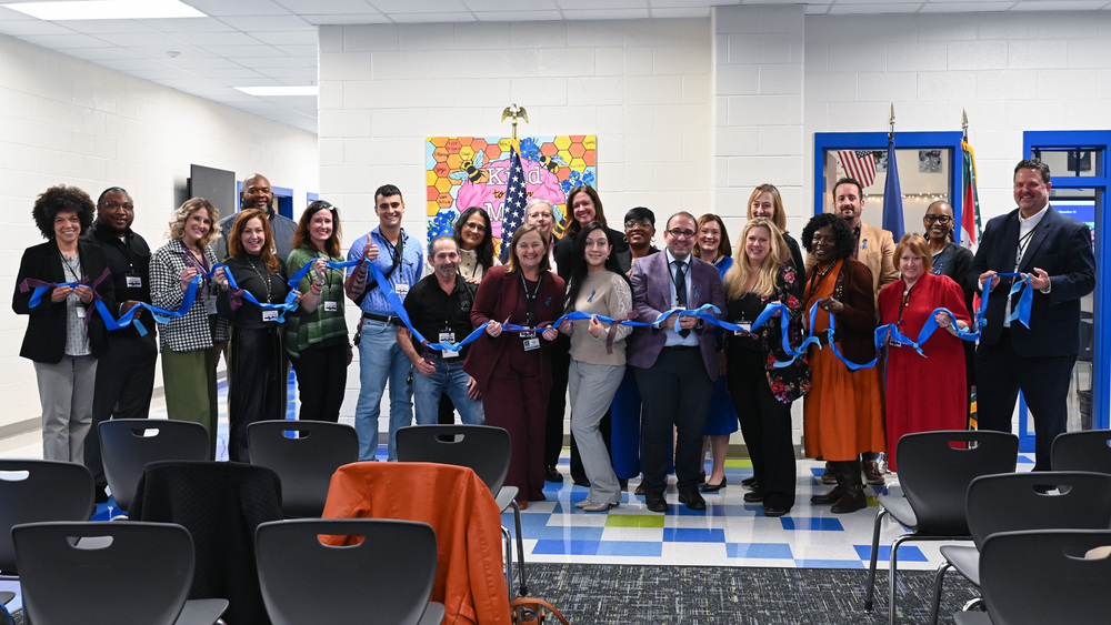RISE Academy ribbon cutting featuring LCPS staff
