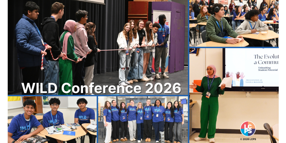 Group of diverse students standing on stage holding a rope during the WILD Conference 2026 event.