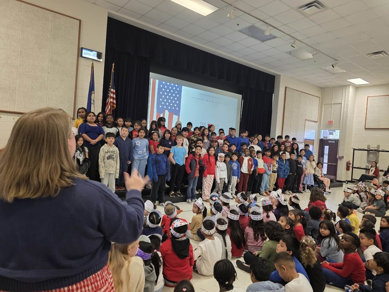 Ms. Hill directs students