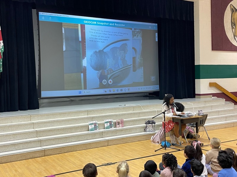 Bellen Woodard reading her book