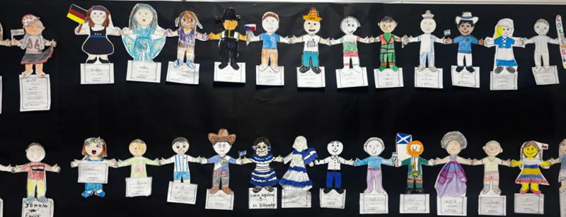 Paper dolls that students made to reflect the vast cultural heritages of our school