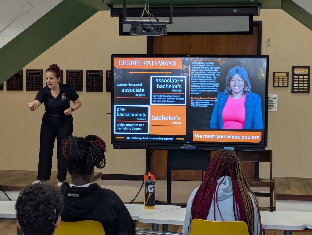 Presenter next to a slideshow