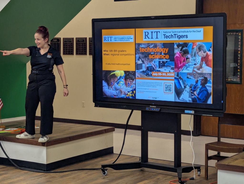 Presenter next to a slideshow