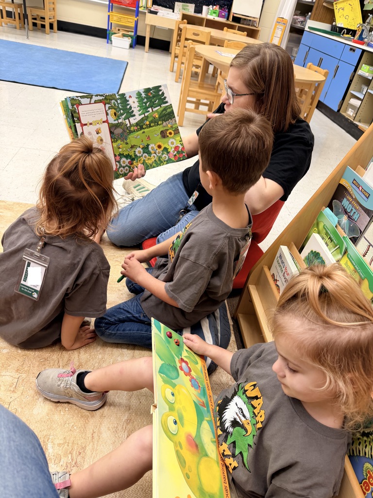 Students and staff reading books