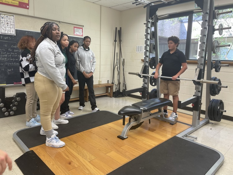 students in weightlifting room
