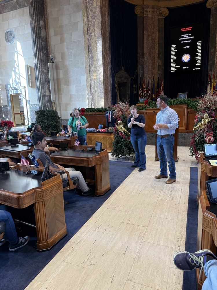 students smiling at the capitol