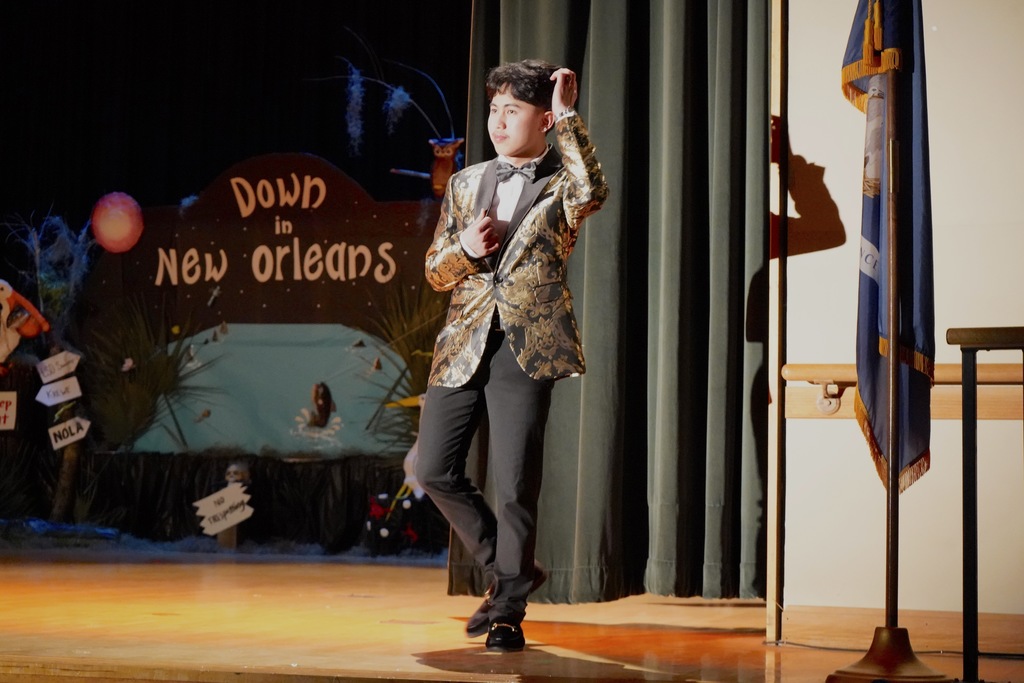 Student walking on stage