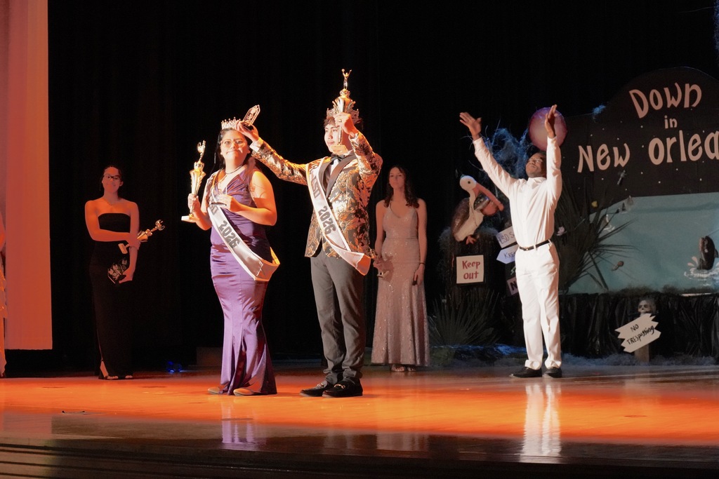 Winners on stage with trophies