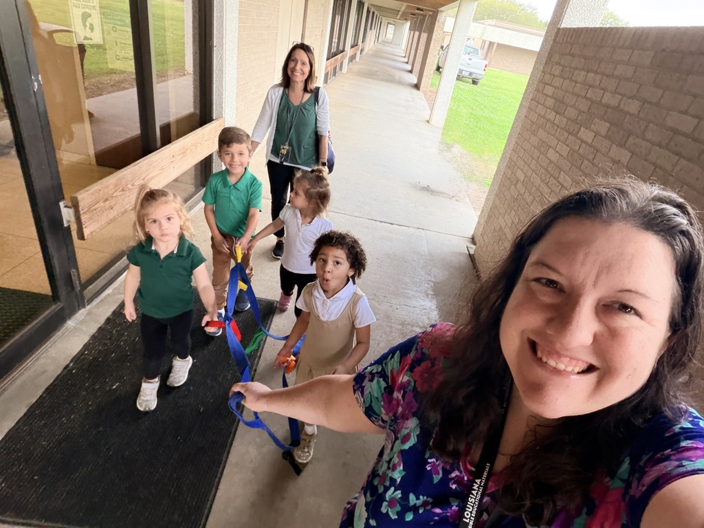 Staff and students walking