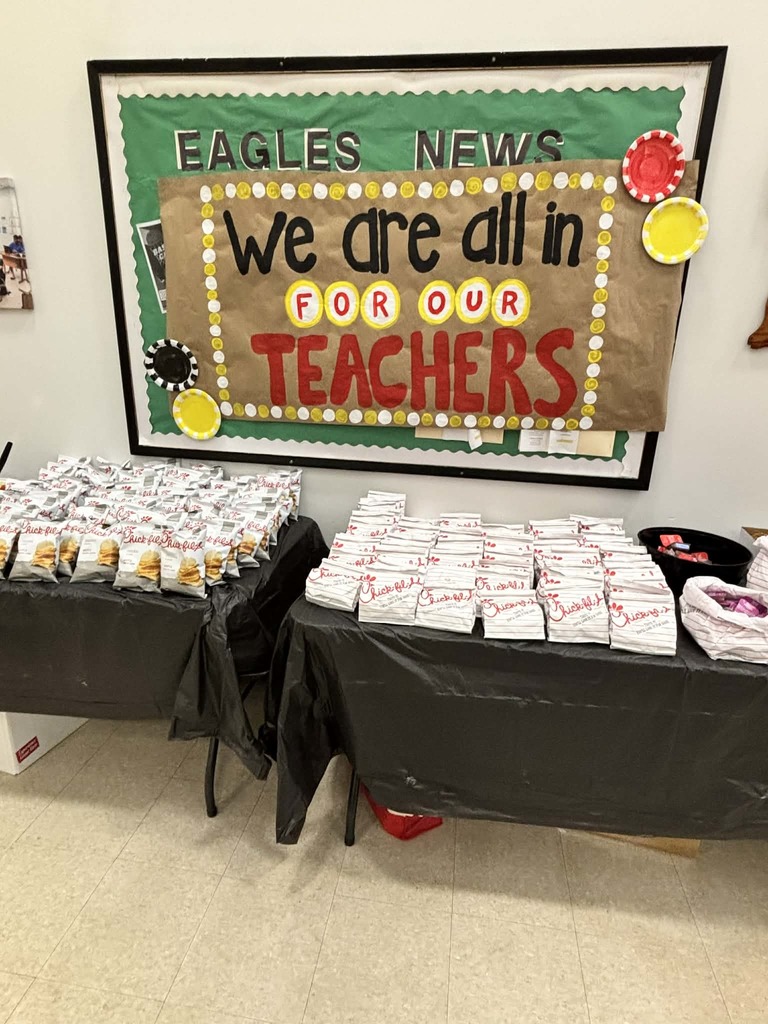 Chick fil a food pictured in front of a sign that reads "We are all in for our teachers"