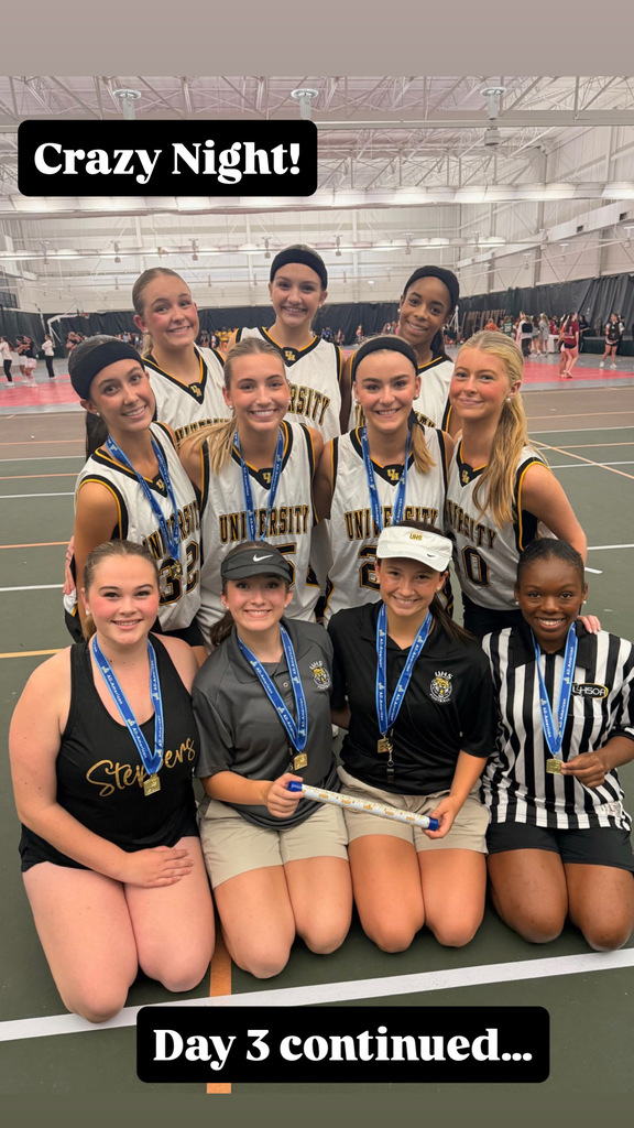 girls team posed in basketball uniforms pictured on two rows with award