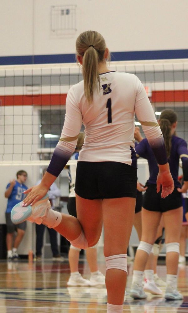 Kelsey Wiping her shoes off.