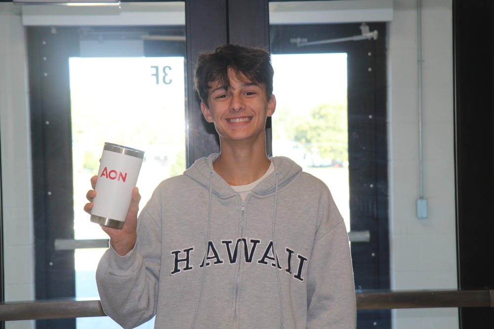 Sophmore Jack Kilton is all smiles holding his morning coffee. This morning he had an iced carmel latte with extra creamy cold foam.