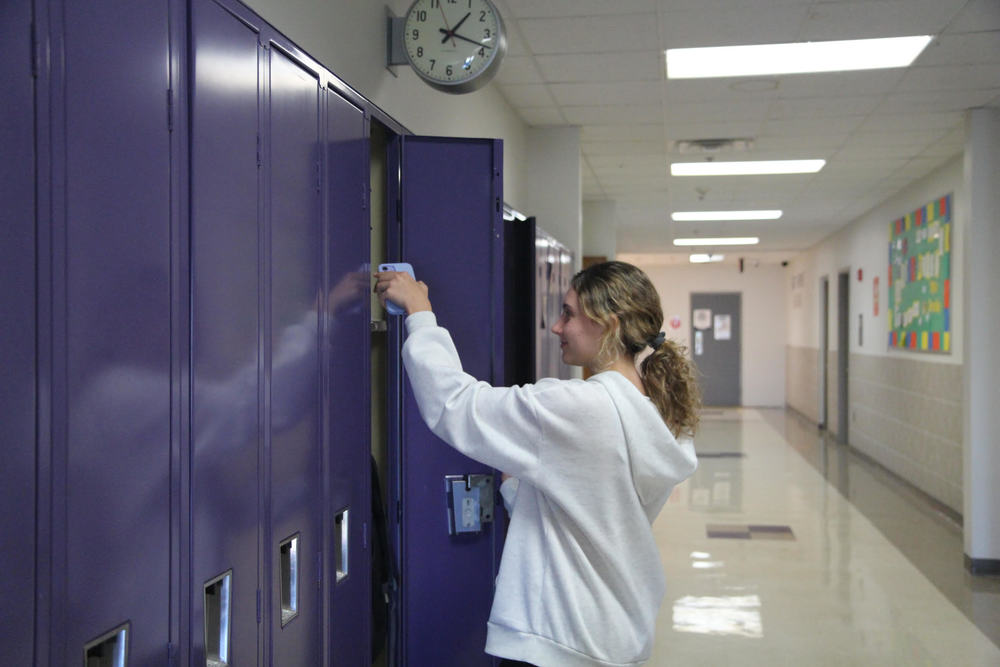 Sophomore Kylie Hanson putting her phone away after lunch, the only time students get to be on their phones. 