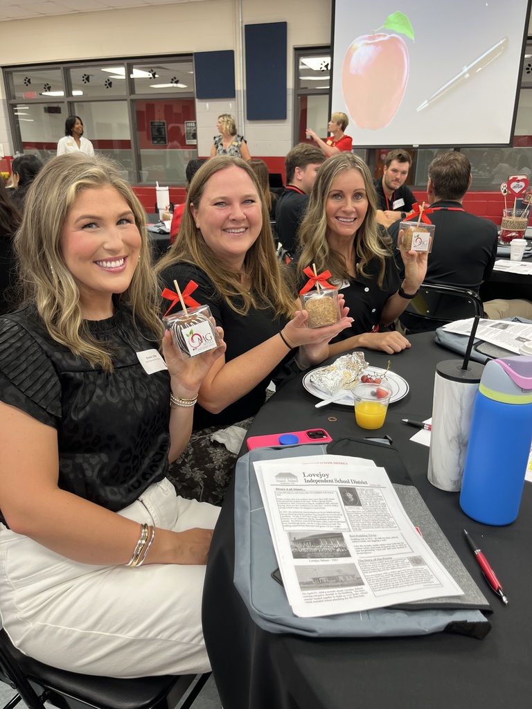 Teachers Holding Apples