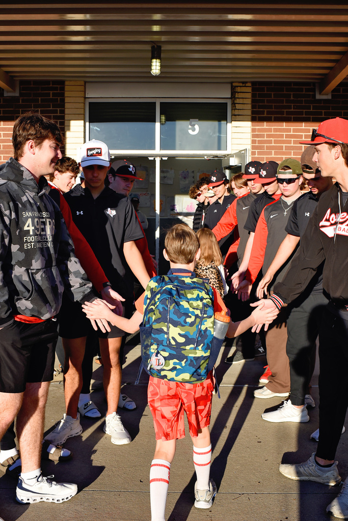 LHS Majestics, Golf, Track & Field, and Baseball programs visiting Puster Elementary for Reading with the Leopards