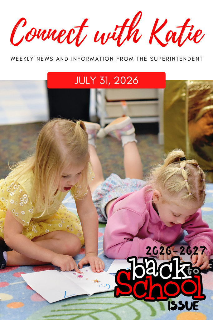 Two young girls on the floor, one reading, one focused on a book. Date reads July 31, 2026.
