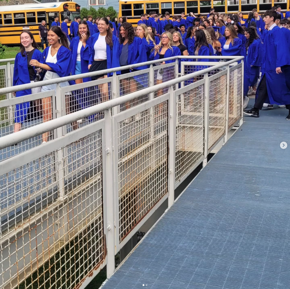Graduating students wearing graduation caps