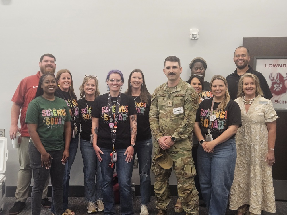 Mrs. Croft with fellow science teachers and administration