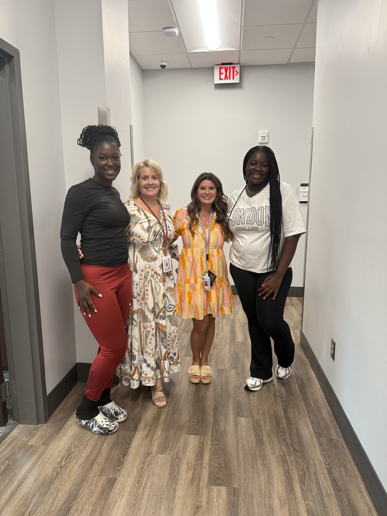 Mrs. Pearson and Mrs. Page with students