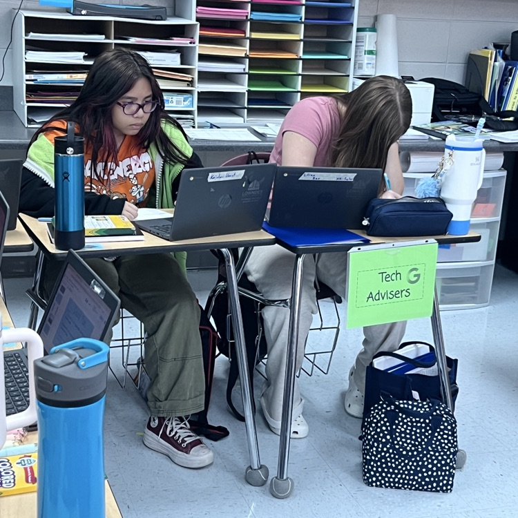 students working in groups 