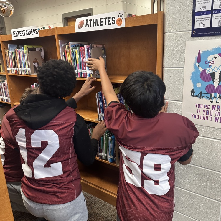 students looking for books