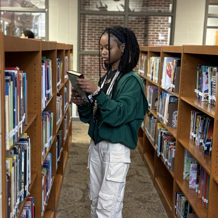 student looking for a book