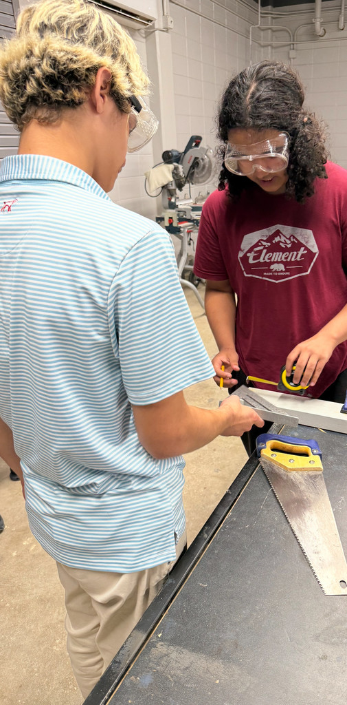 Students using square and measuring tape