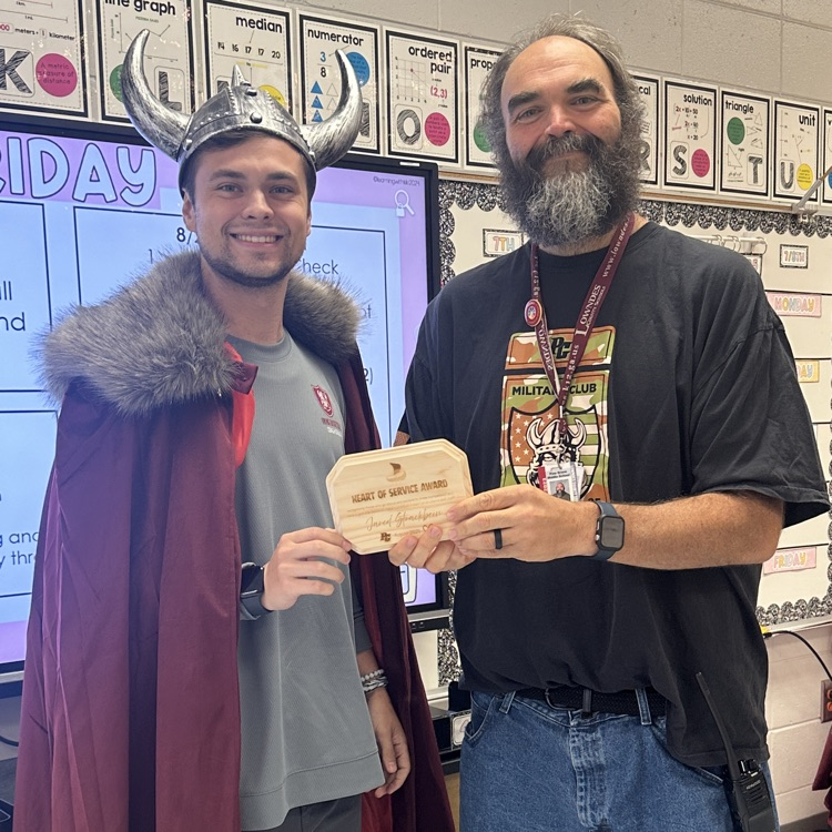 teacher receiving award