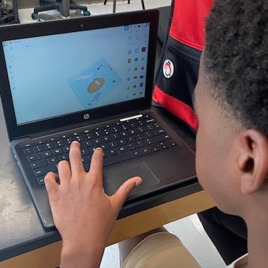 student designing cell