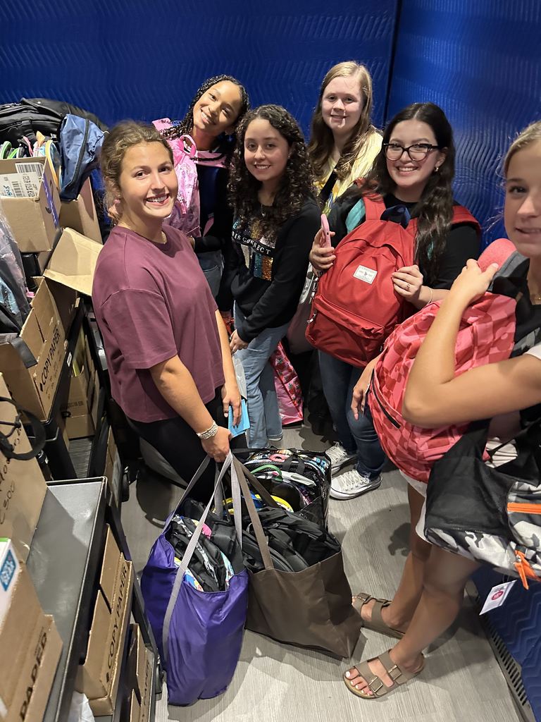 Students sorting donated supplies