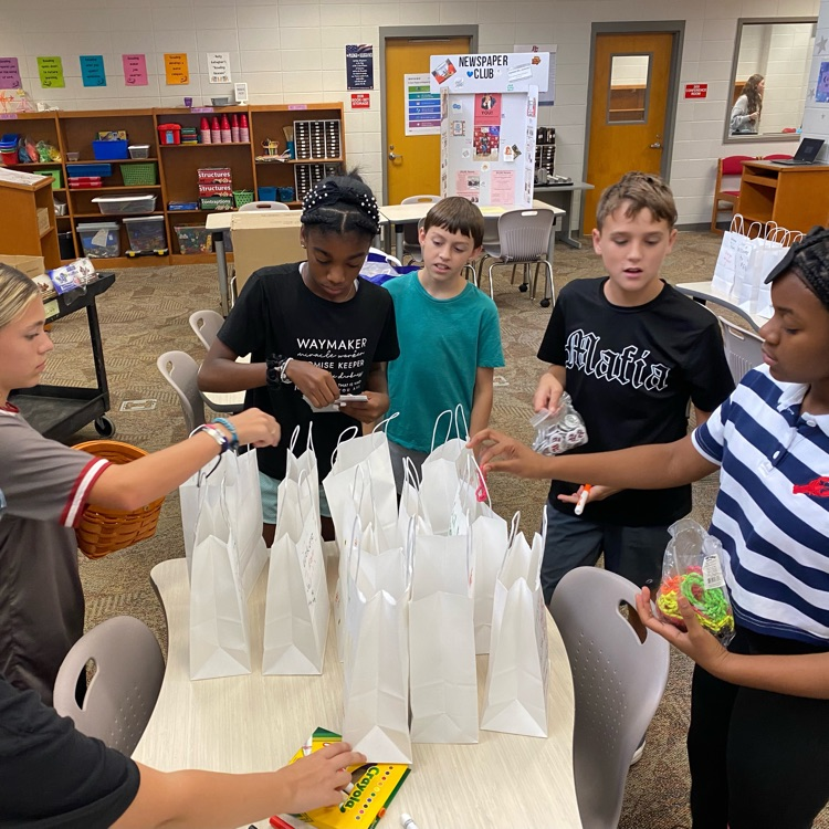 envoys stuffing bags