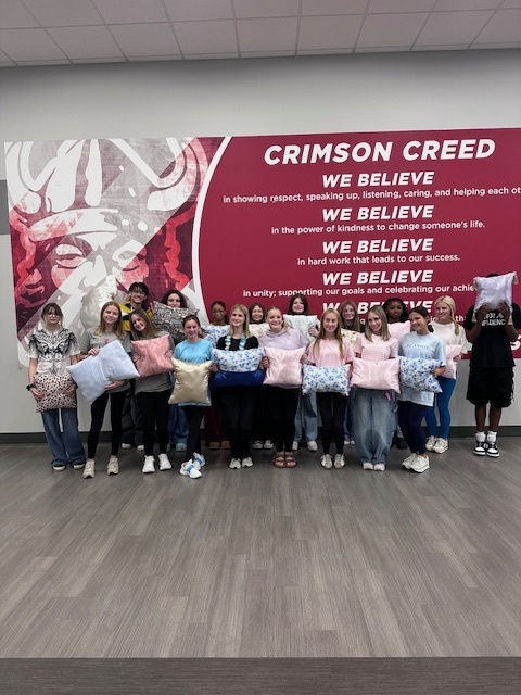 Students with the pillows they made
