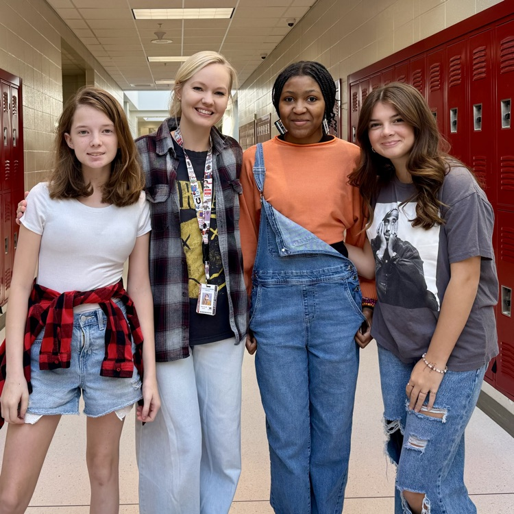 teacher and students in 90s clothes