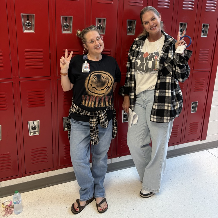 teacher and students in 90s clothes