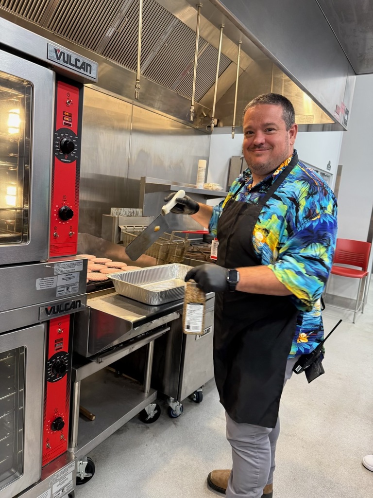 Mr. Dunn grilling burgers