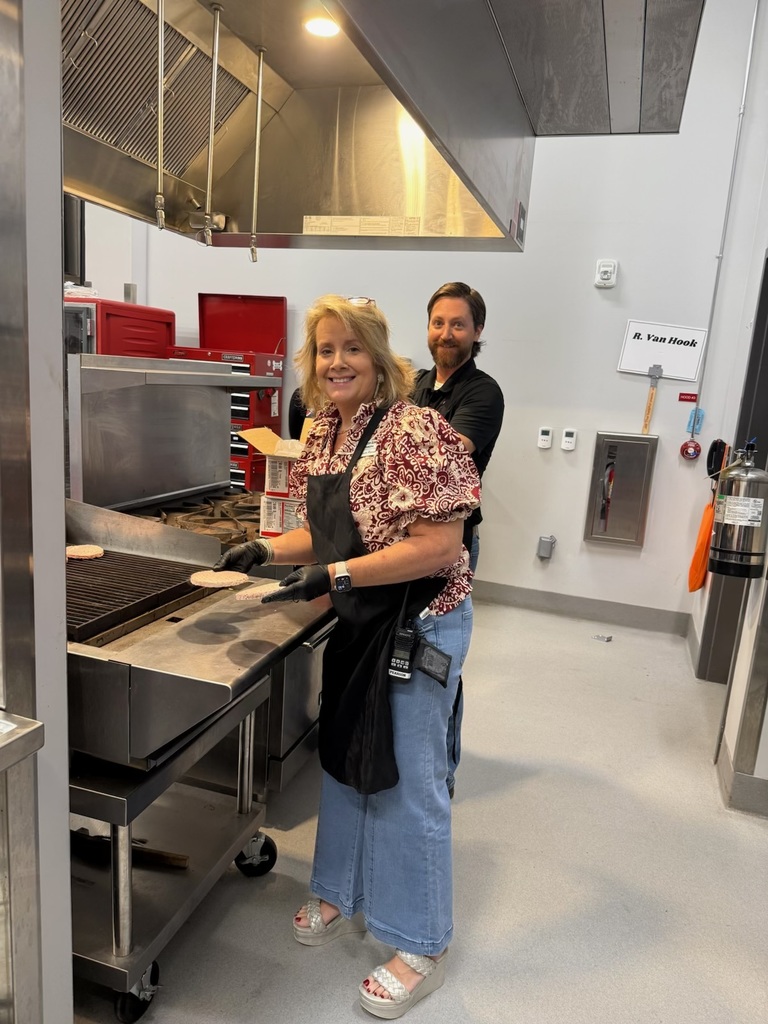 Mrs. Pearson and Mr. VanHook in the kitchen