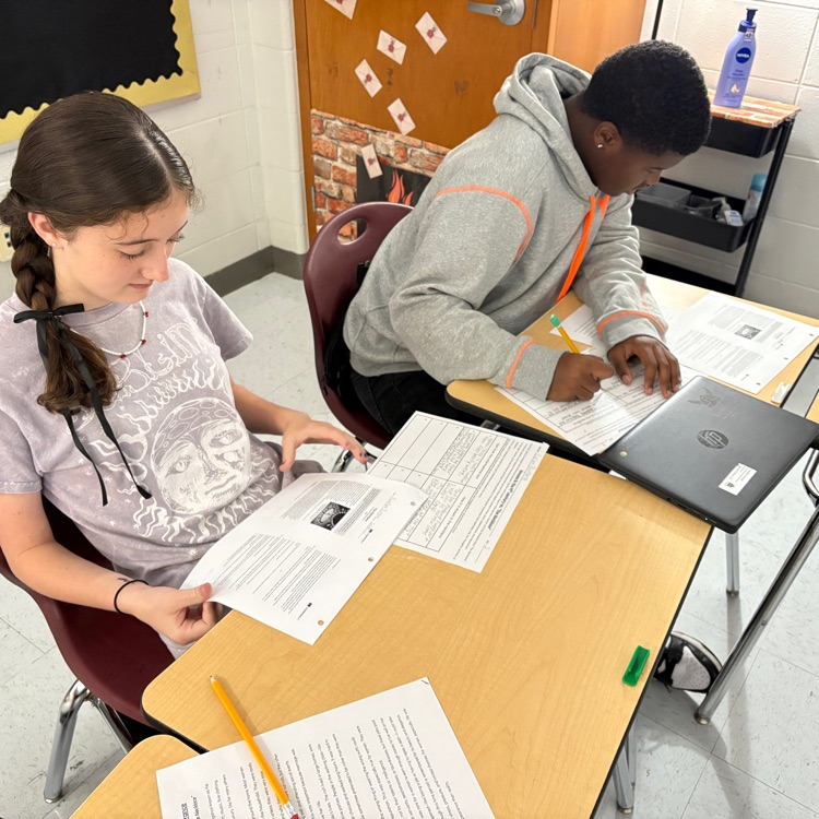students comparing texts