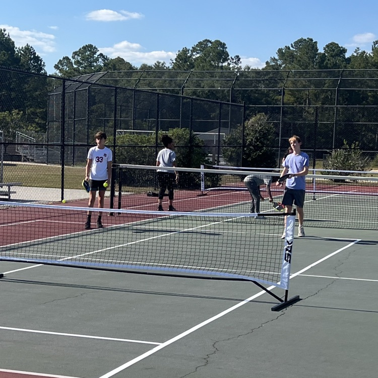 kids playing pickleball