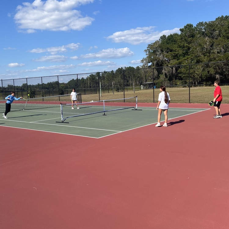 kids playing pickleball