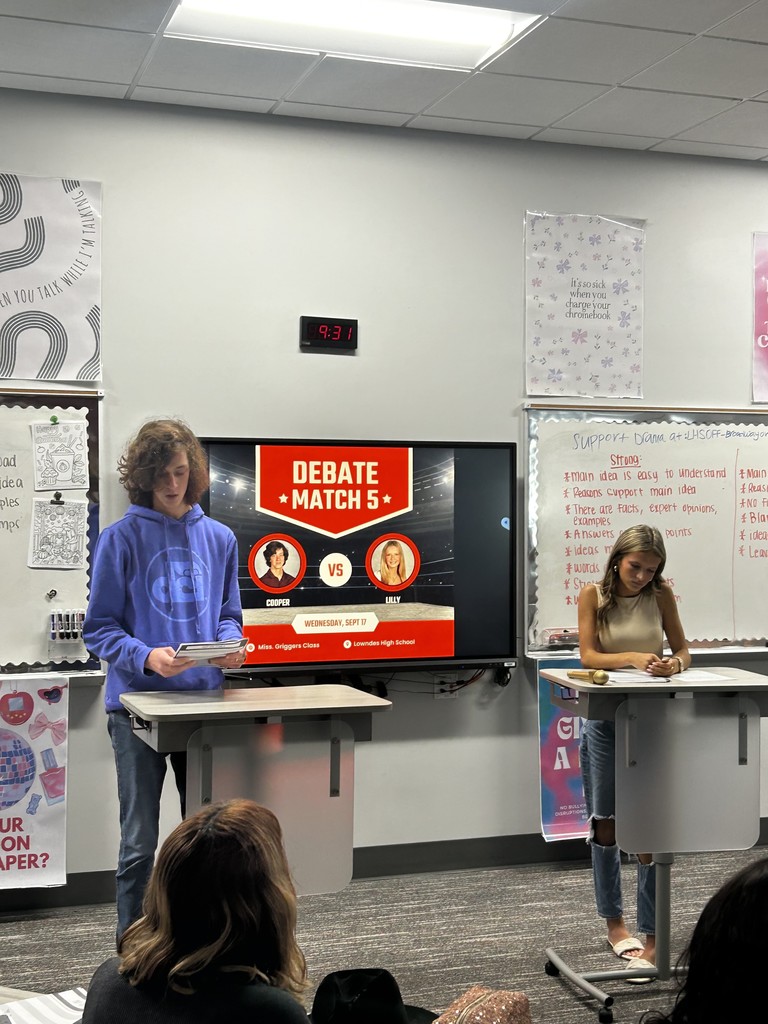Two students participating in a debate