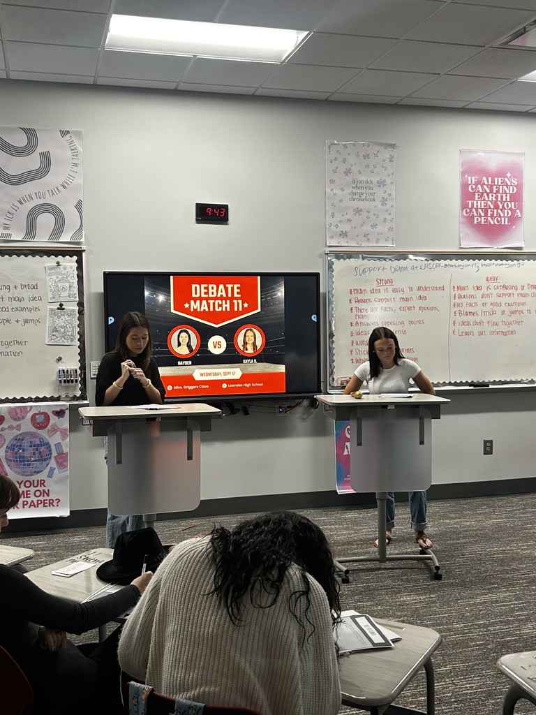 Two students participating in a debate