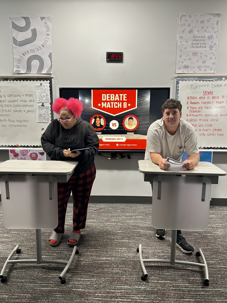 Two students participating in a debate