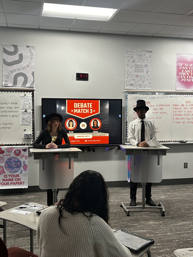 Two students participating in a debate